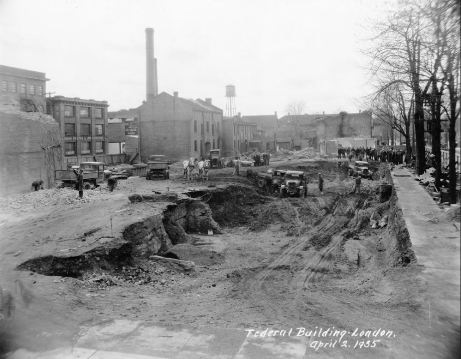 Photo of workers starting to dig the foundation for the Dominion Public Building. April, 1935.