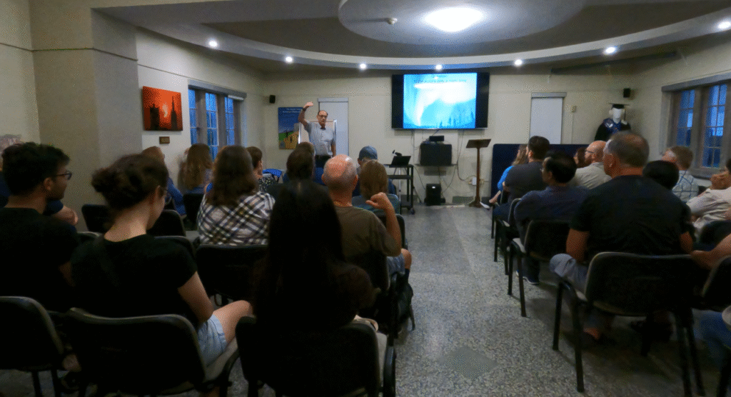 Audience listening to a speaker at the Cronyn Observatory Building, Western University.