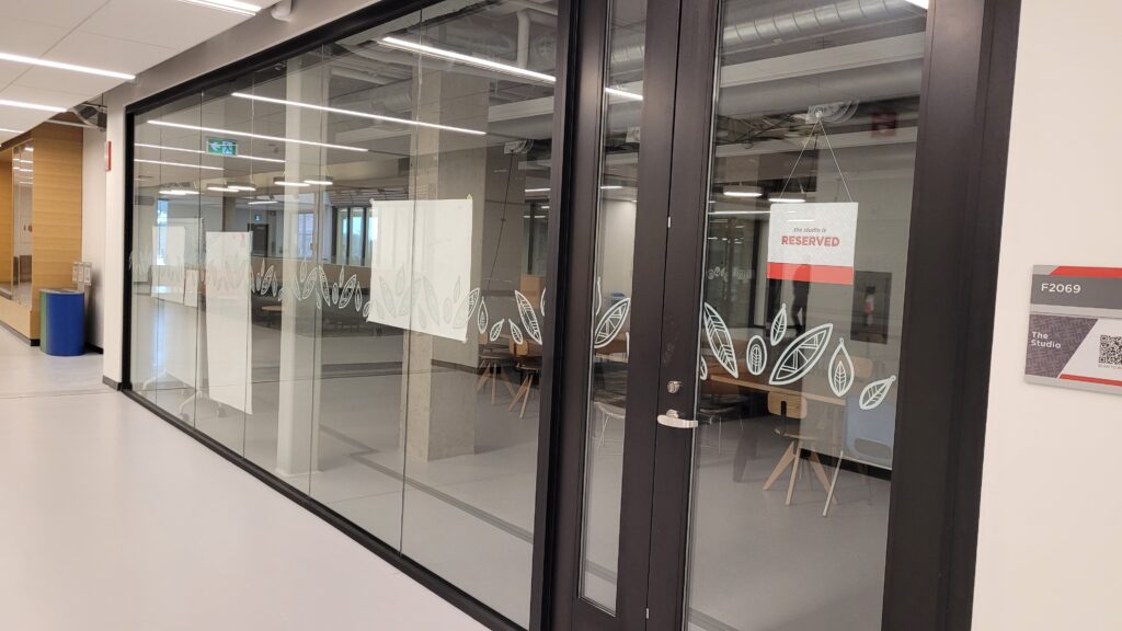 Murals on meeting room windows.