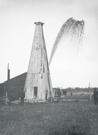 Oil shoots out of a well in Petrolia, Ontario, in 1902.