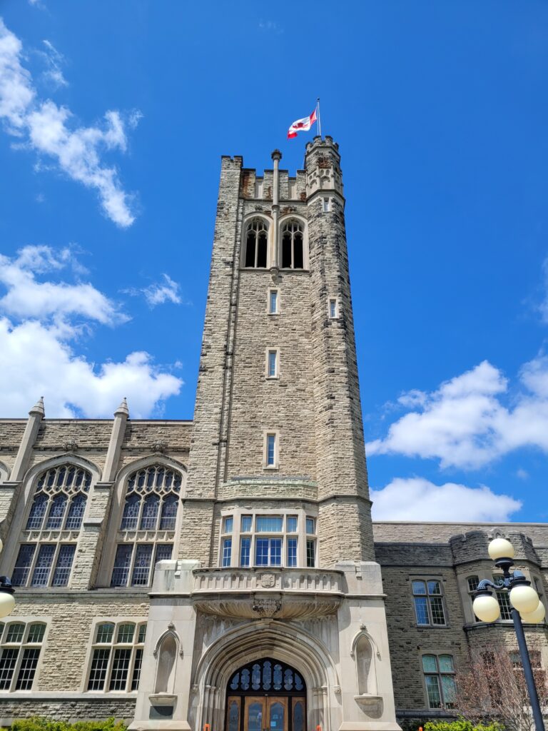 Vertical view of the tall stone tower.