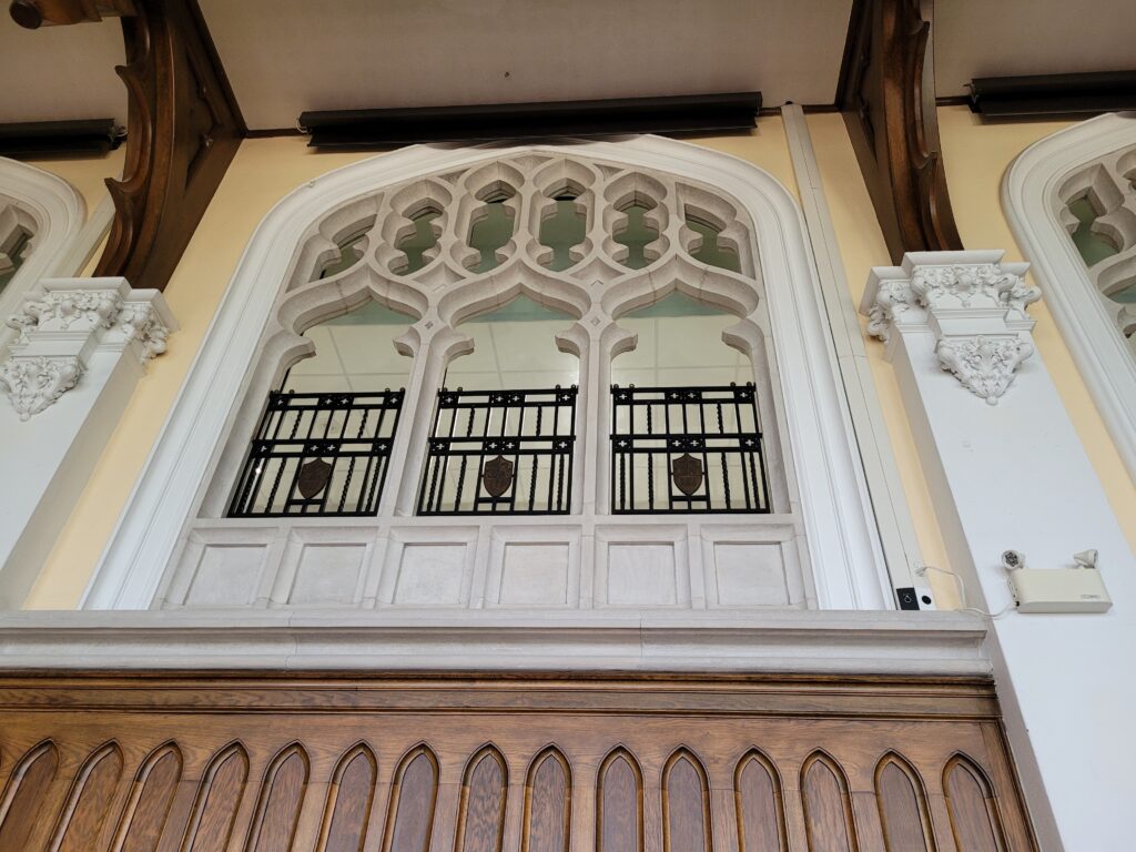 Elegant carved woodwork and stonework adorn the walls.