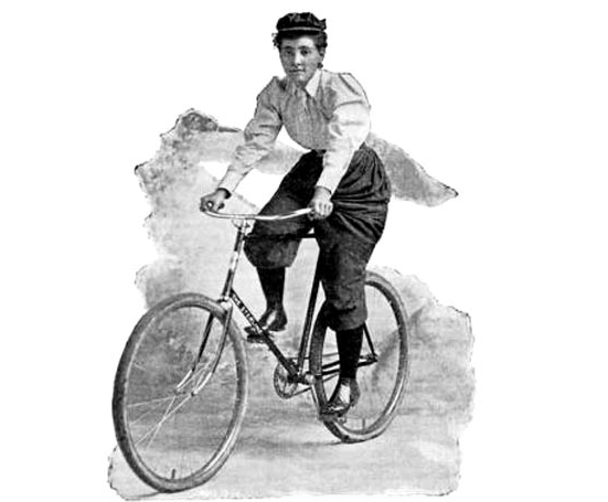 Annie “Londonderry” Kopchovsky, the first woman to cycle around the world in 1884-85, was an advocate of rational dress, shown here riding a safety bicycle with pants instead of a dress.