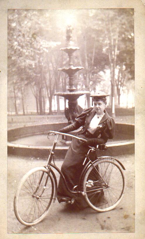 Woman with a safety bicycle, 1890s. 