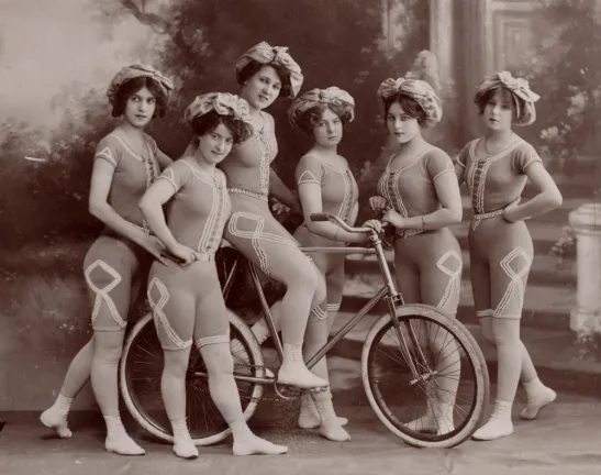 Six women of the Kaufmann Troupe of trick cyclists, looking very modern in their one-piece uniforms, circa 1900.