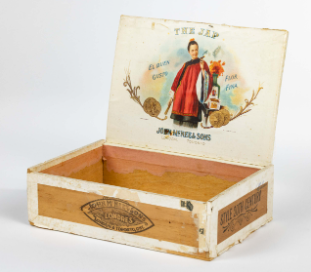 Early cigar box depicting racist stereotypes, this one of Japanese people.