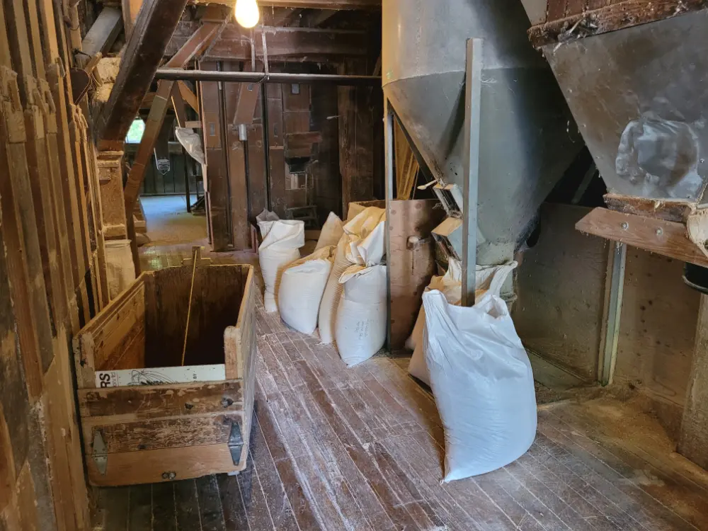 Bulk bags of ground flour awaiting distribution.