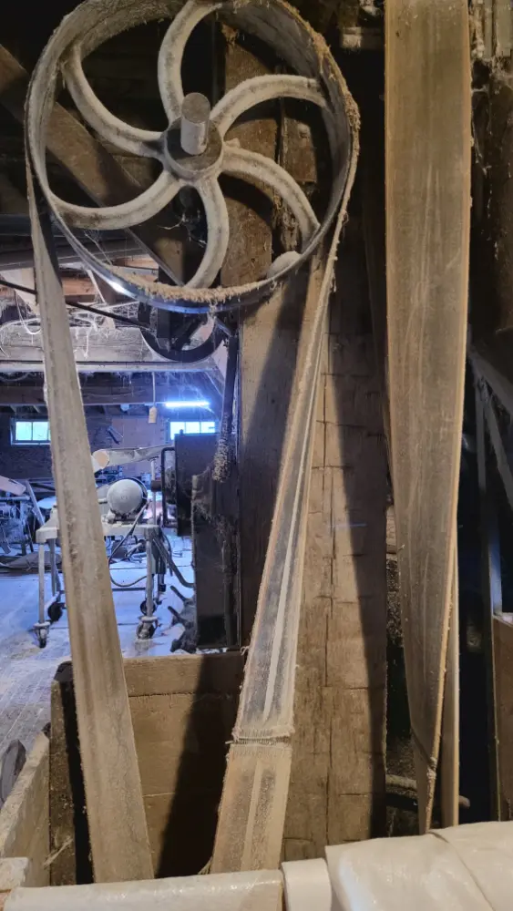 Century old leather belts running pulleys in Arva Mill.