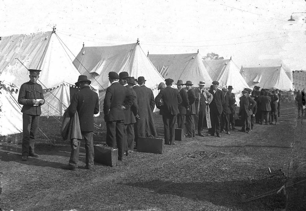 Recruits line up at the training camp at the Carling Heights Camp on Oxford Street, c. 1915.
