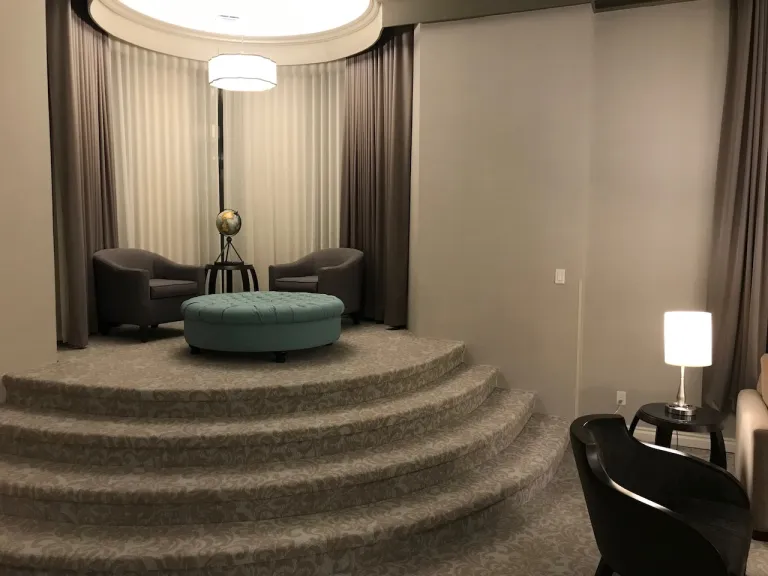 View of the elevated living space in the corner turret in the Royal Suite on the second floor. These rooms are spacious with impressive twenty-foot ceilings. 