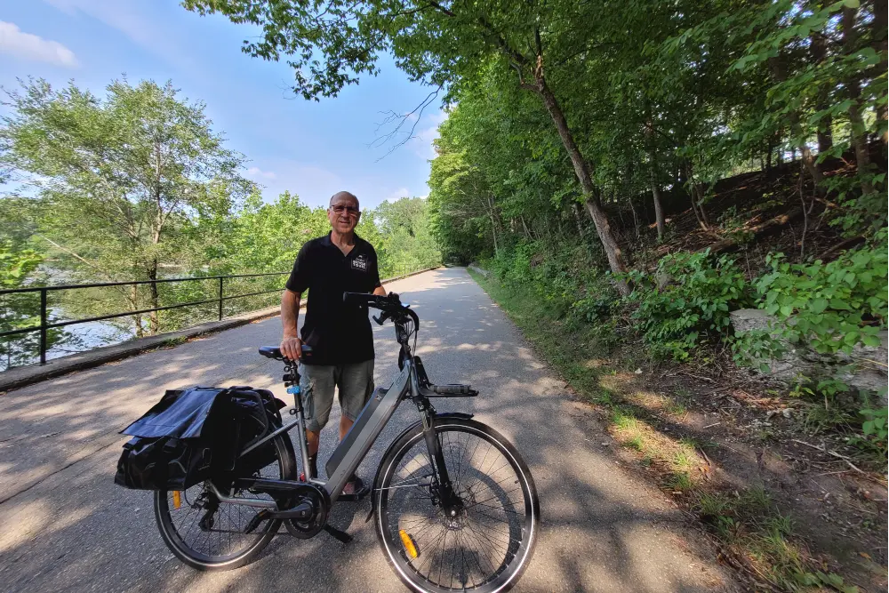 Author, Lawrence Durham, standing on the Thames Valley Parkway between the Thames River and Woodland Cemetery.