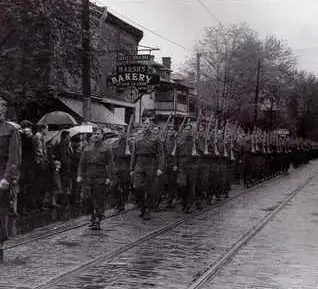Soldiers marching down Dundas Street in Old East Village in 1940.