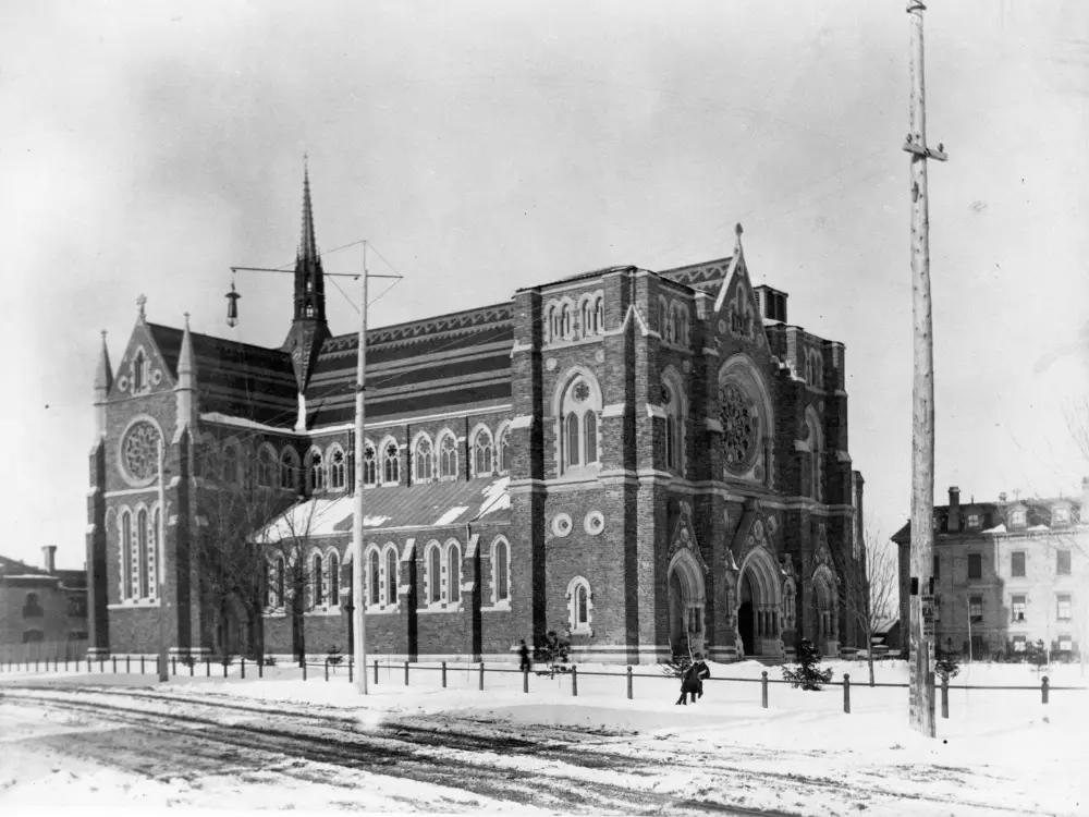 The larger St Peter's Cathedral, as it appeared in 1885, in front it much smaller predecessor.