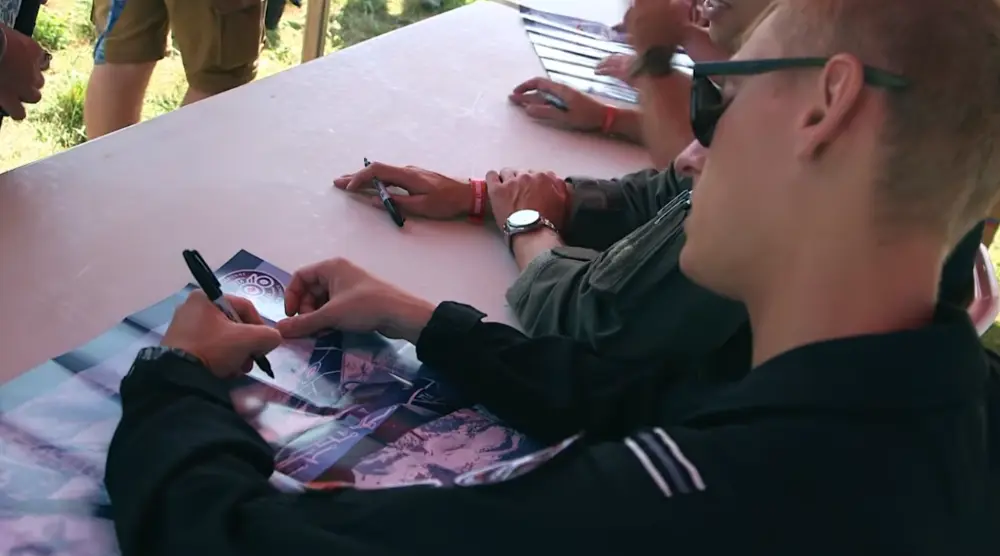 Pilots are on hand to talk to the crowds and sign autographs.