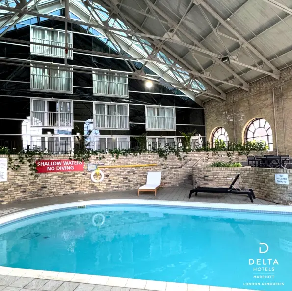 Overlooking the pool area are the first few floors of the 20-storey tower.