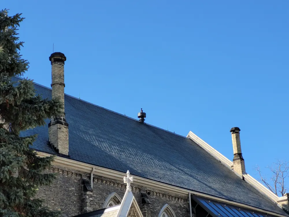 Roof top of First St Andrews United Church in London, Ontario, showing swift chimneys.