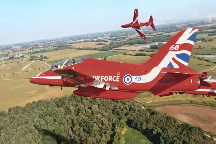 Royal Air Force Red Arrows flying in formation.