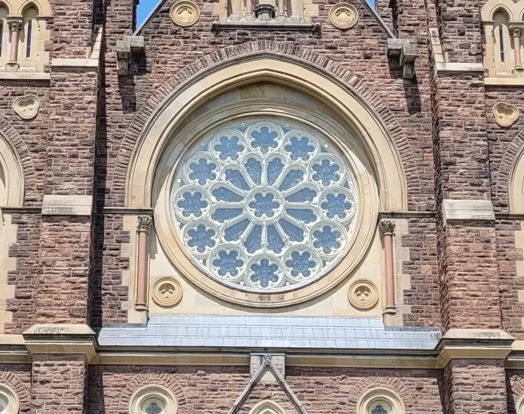 A close up view of the rose window of St Peter's.