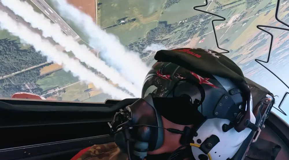 The view from inside the cockpit of an inverted jet aircraft.