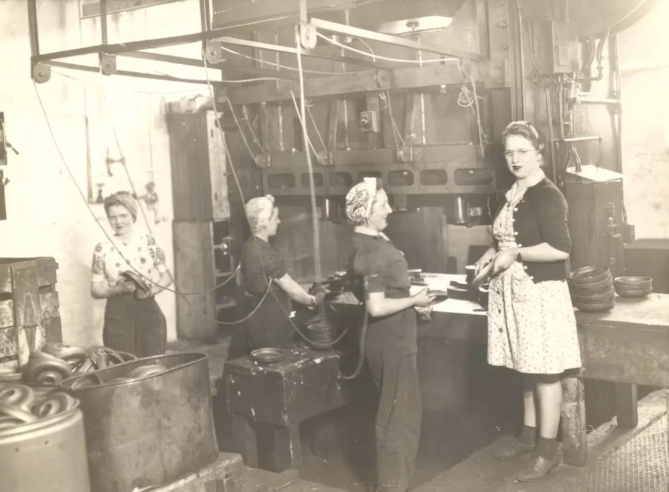 Women working in a London factory that produced plates for depth charges.