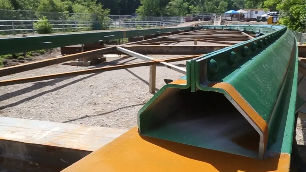 Close-up view showing the pins that were slotted through the metal struts in the bridge.